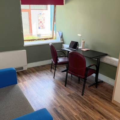 Alternative provision space with desk and chairs.
